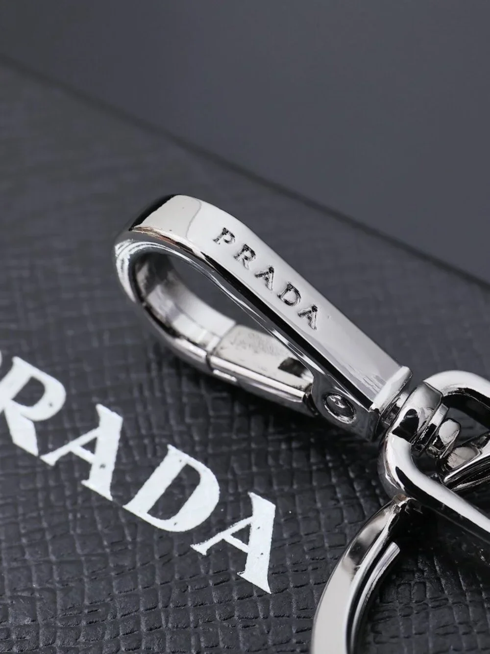 ✨ Prada Black Triangle Logo Leather Keychain